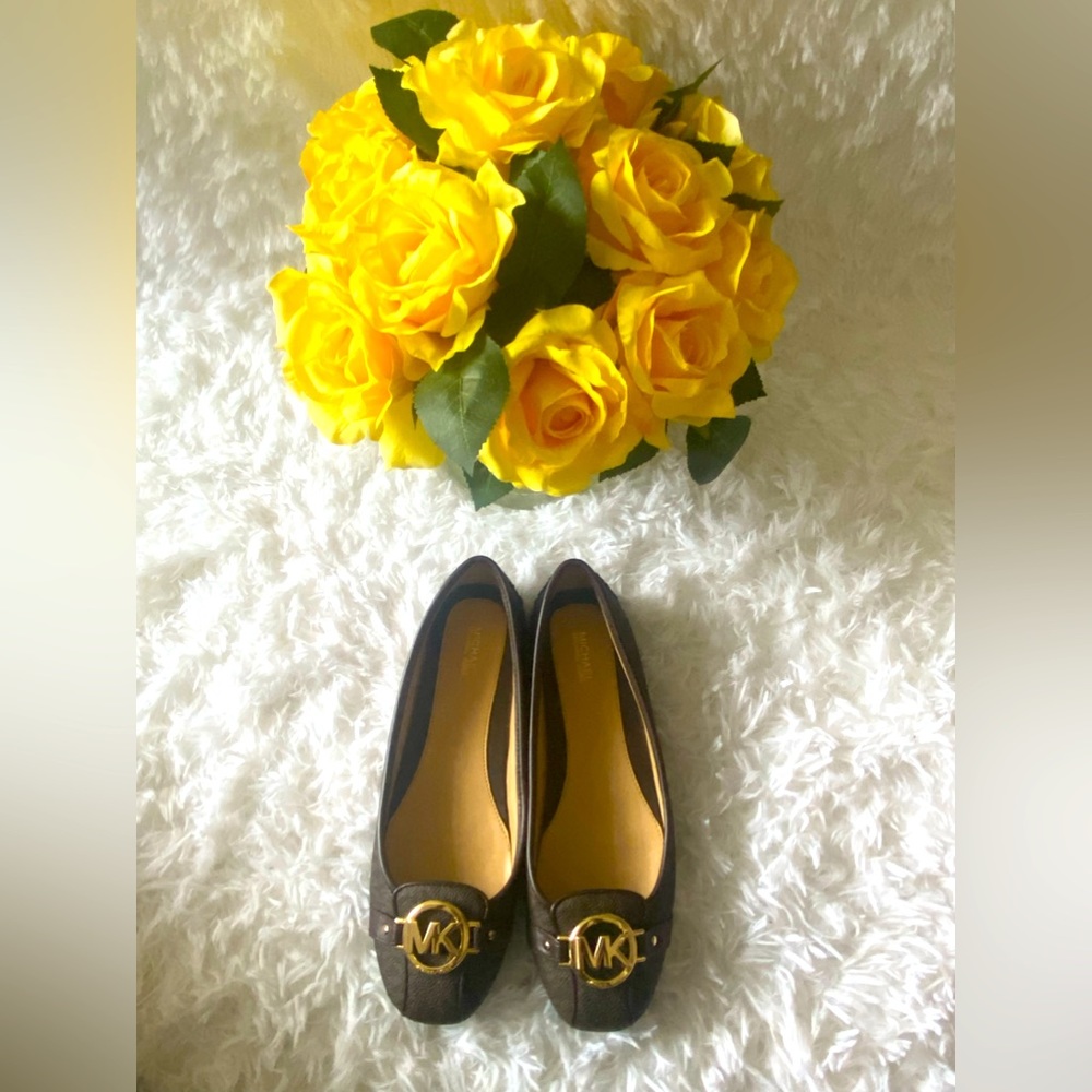 Black and brown flats from Michael Kors